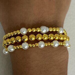 Gold and white pearl bracelet set #bracelets